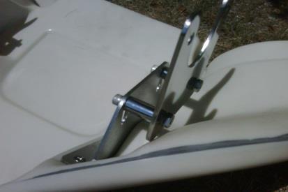 Attach the fork clamps to the forks (Allen head screws should be on the outside of the forks).