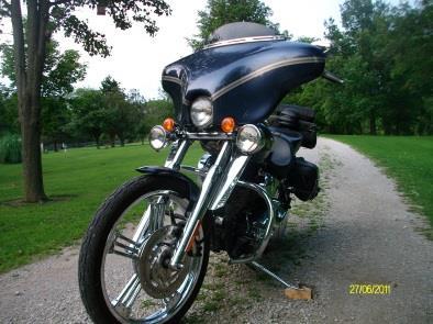 2006 models or newer already have the headlight mounted to the bottom triple tree. 2005 models and older have the headlight mounted on the top triple tree.