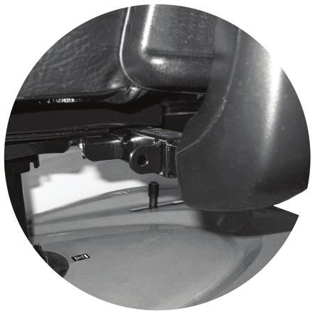 Secure one side of the seat positioning strap to the mounting bracket using the bolt