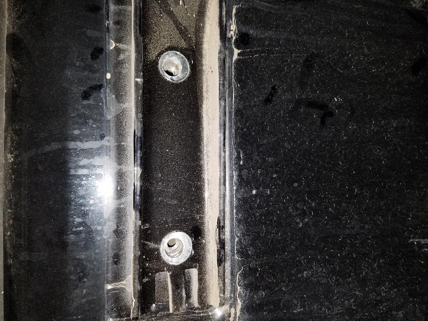 8. Using a 13mm socket remove the 4 bolts that connect the hinges to the tailgate of the Jeep. 9.