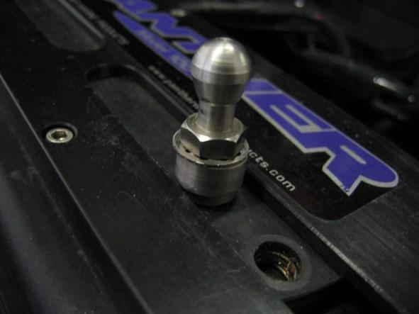 Attach one ball stud to the front of your kicker motor.