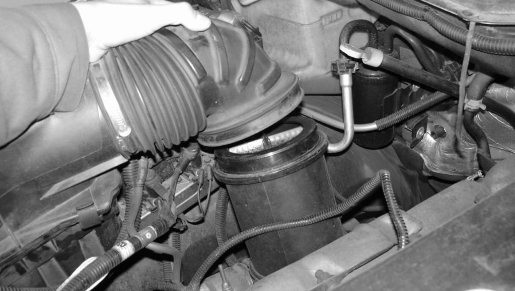 Figure 11 Disengage the flexible air intake duct