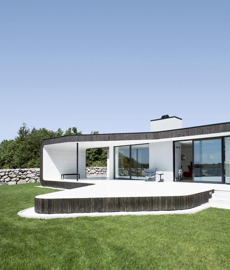 Timeless residential design with aluminium sliding and folding sliding systems Schüco Window Systems AWS Aluminium sliding and folding sliding doors from Schüco impress with their versatility.