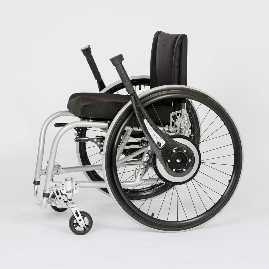 Include up to 2 images if desired by inserting them in the Word Document. This is a photo of the current production Wijit on a Colours wheelchair.
