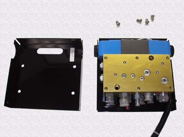 Figure 2-3 Remove Front Panel Screws from Steering Valve 2.