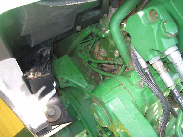 side of the cab. See Figure 2-25. Figure 2-25 Route Hoses Hoses Routed to Here 14.