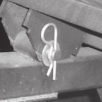 Secure with (1) 5/8 washer P#(K0058) and (1) 5/32 x 2-5/8 hair pin clip P#(K0088) per pivot pin. Refer to Figure 2-7.
