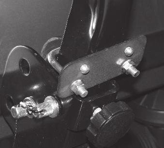 Rotate the engine throttle lever to the stop position. Thread the wire end of the throttle cable into the engine throttle lever eyelet and tighten the screw.