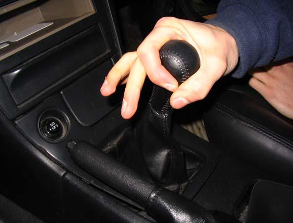 Page 3 1. Remove shift knob by rotating it counter-clockwise.