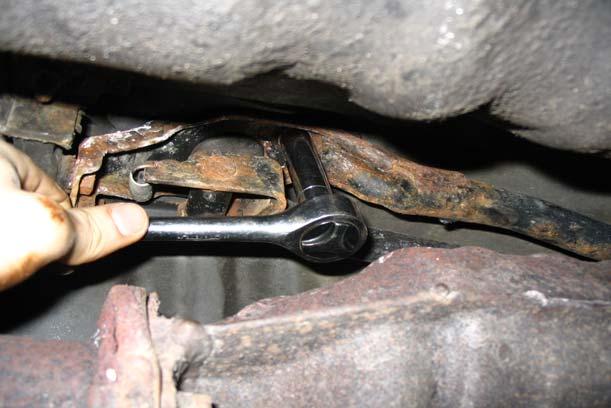 The use of vice grips may be needed if the passenger side head bolt is rusted.