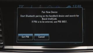 INFOTAINMENT SYSTEM Buick ShopF In-vehicle apps connecting to music, news, weather, travel information and more are available for download to the infotainment system through the SHOP icon on the Home