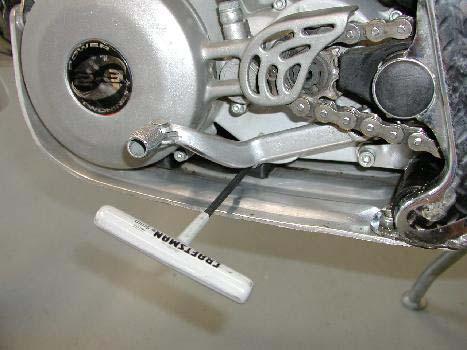 Bolt to be removed. Use a 5mm Allen wrench and remove the bolt.