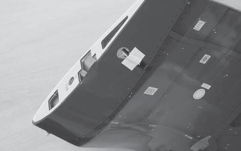 The aileron has a block wood plate for mounting the control horn. One aileron control horn in positioned on each aileron.