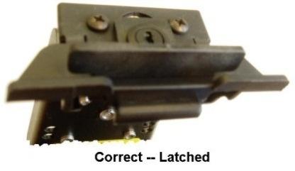 This will push the latch down into the slot on the xtablet T7000. 4. Turn the key in the cradle slide latching mechanism to lock in the xtablet T7000.