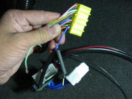 Next, insert the other male terminated wire from the plug-in XEDE harness into the end of the female