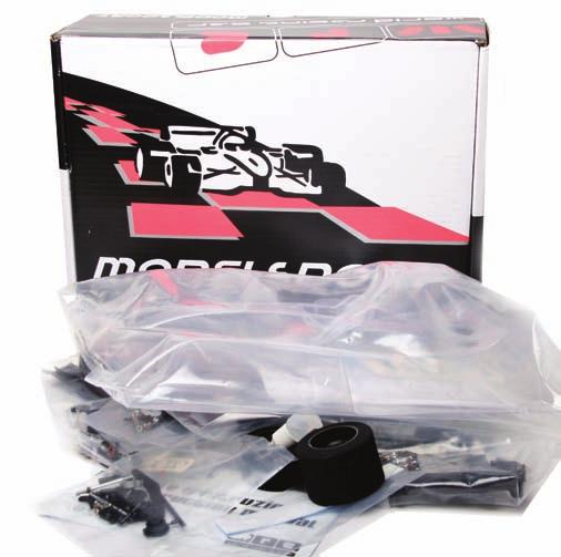 It features adjustable timing and excellent performance Above: The contents of the box TRANSFERRING THE KNOWLEDGE TO R/C Considering World Racing Car is a small company in the scheme of things R/C,