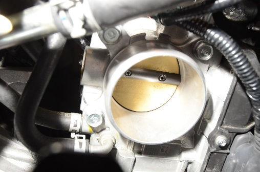 NOTE: The mounting point on the bottom side of the intake manifold will not be used.