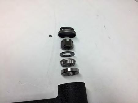 Install the seal on the bottom of the tire carrier.