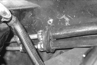 Locate the discharge hose assembly.
