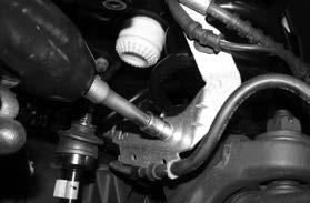 SEE FIGURE 1 4. Remove the front shocks and discard, save hardware. 5. Lower the front axle allowing the coil springs to come free of tension and remove the coil springs.