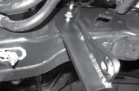 25. Install FT30672 (steering stabilizer drop bracket) in the factory location using the factory hardware. Torque to 52 ft-lbs. SEE FIGURE 19 FIGURE 21 - STEP 27 FIGURE 19 - STEP 25 26.