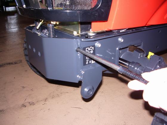 NOTE HOW TO RELEASE THE LATCH TO OPEN THE HOOD Insert the tools about 300m/m length round stick from the hole of