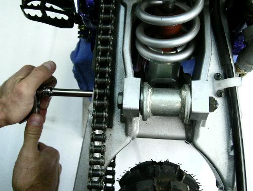 3. Remove upper and lower shock mounting hardware and remove the stock shock.