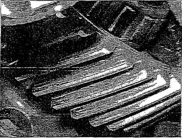Standard has seen electrolytic pitting of gear teeth (photo 71-29) similar to that seen in automatic transmissions which also have aluminum cases.