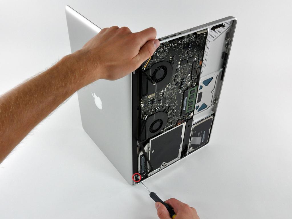 Step 11 Open your MacBook Pro so the display is perpendicular to the upper case. Place your opened MacBook Pro on a table as pictured.