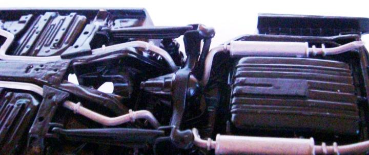 The left upper A arm, right upper A arm and steering gear box are painted