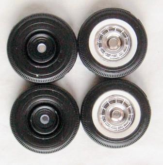 The inner wheels are installed on the inside tire half and glued to the outer wheels.