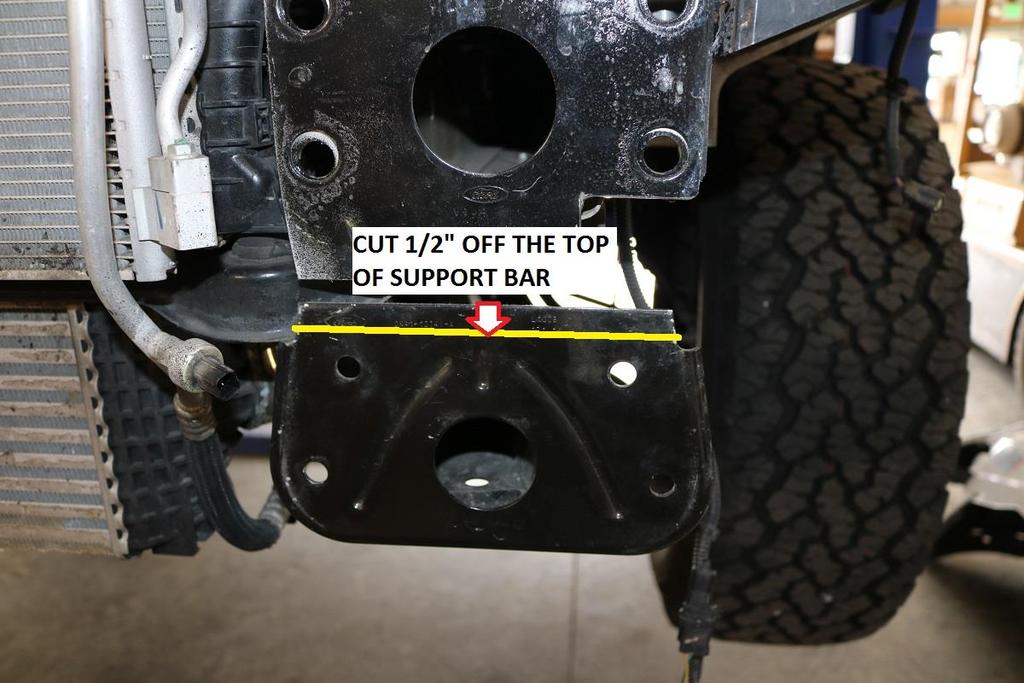 27) Mark a cut line ½ from the top lip of the front flange of the previously removed