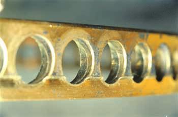 denting occurs on the raceway surface or rolling element surface.