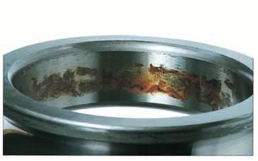 lubrication Photo 10-6 Inner ring of a double-row tapered roller bearing Fretting wear of raceway and stepped