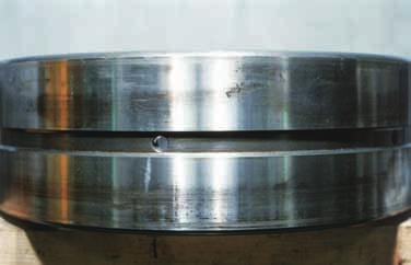 bearing Seizure occur at large end face of roller Poor lubrication and excessive axial load Photo 14-1 Inner ring of a spherical roller bearing Creep accompanied by