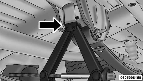 NOTE: The rear jacking location is located in front of the rear tire and in front of the leaf spring mount.