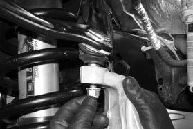 Torque the upper ball joint to 85 ft-lbs and the lower ball joint to 110