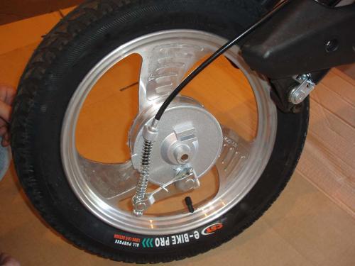 Slide wheel int frnt frks being sure t align brake hub