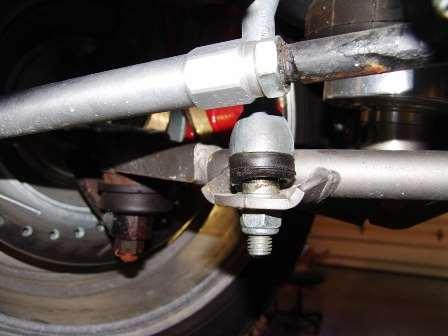 6. Attach the straight end to the lower control arm. A T-bushing is required between the PosiLink and the lower control arm.
