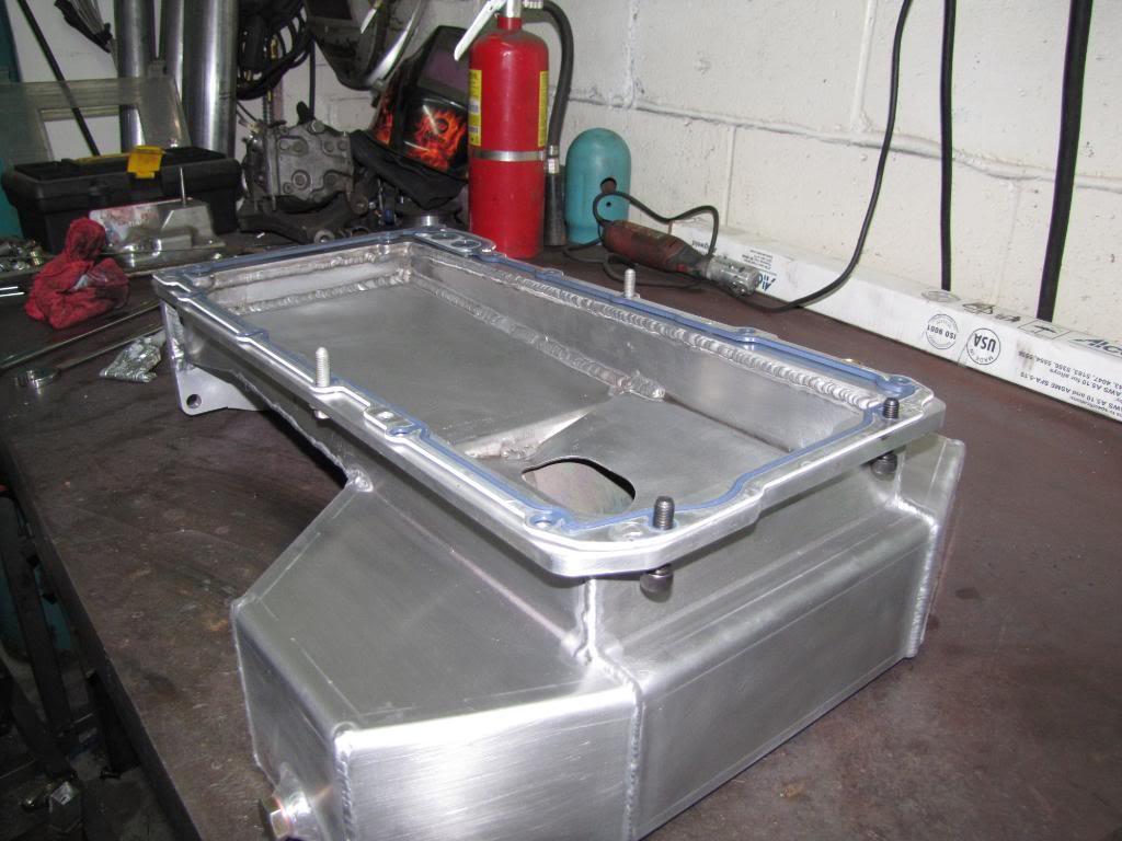 Here is the new high capacity Sikky oil pan. Prep the new pan by pre installing the gasket.