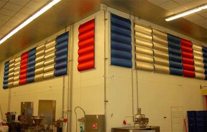 The post formed Noise Resist absorbers are attached to hinged wall frames so that they can be steam cleaned from both sides.