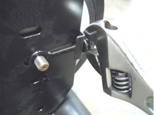 FIGURE A FIGURE B 4) Remove the nut on each side putting tension on the generator belt
