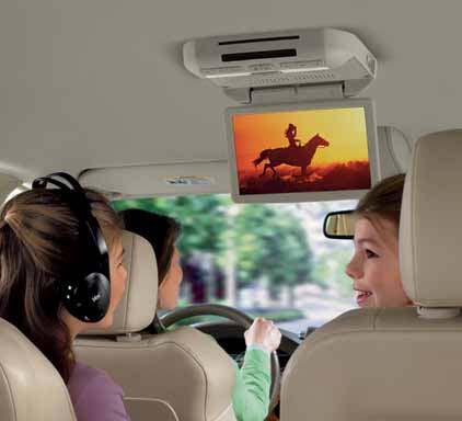 Features auxiliary inputs for a video camera, CD player and popular video game units, plus two wireless headphones and an infrared remote. 2. HEAD RESTRAINT DVD REAR SEAT VIDEO.