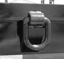 spring-assist. Equipment tie downs are located on the trailer.