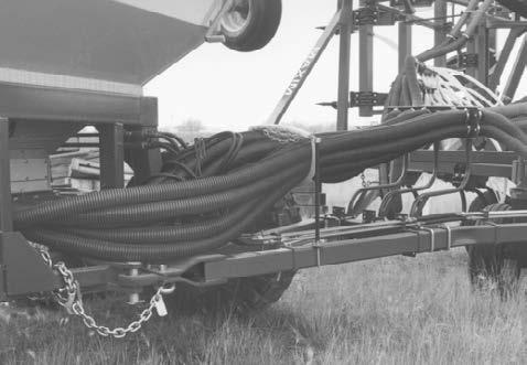 Operation Hitching to Seeding Tool (Tow Between Cart) Connect seed cart to tractor. Back seed cart into position, aligning seeding tool hitch with seed cart.
