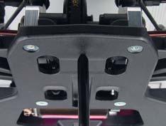 Checking for Rear Tweak Lift and drop the rear end of the car a few centimeters to let the suspension settle. Place a sharp tool underneath the chassis at its middle point, and lift the rear end.
