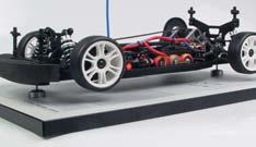 If the chassis stays level without falling to one side, it is balanced.