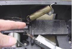 At each end of the hitch, remove the clip and the pin that holds the hitch head on the hitch frame.