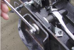 Curt: Using 16MM & 17MM wrenches or sockets, remove the front and rear mounting bolts and