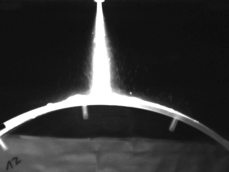 4m/s) was carried out by means of laser light sheet in combination with a CCD-camera. The laser light sheet crossed the spray along its central axis plane y-z (side profile of flat spray).